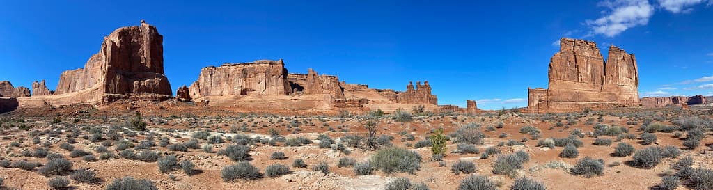 Red-rock landscape in Utah with sandstone formations and open desert sky